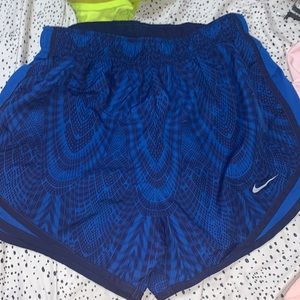 blue nike shorts, size small